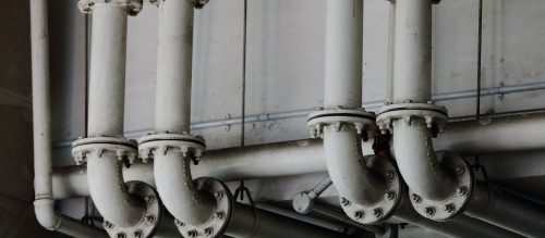 coyote-plumbing-fixing-pipes